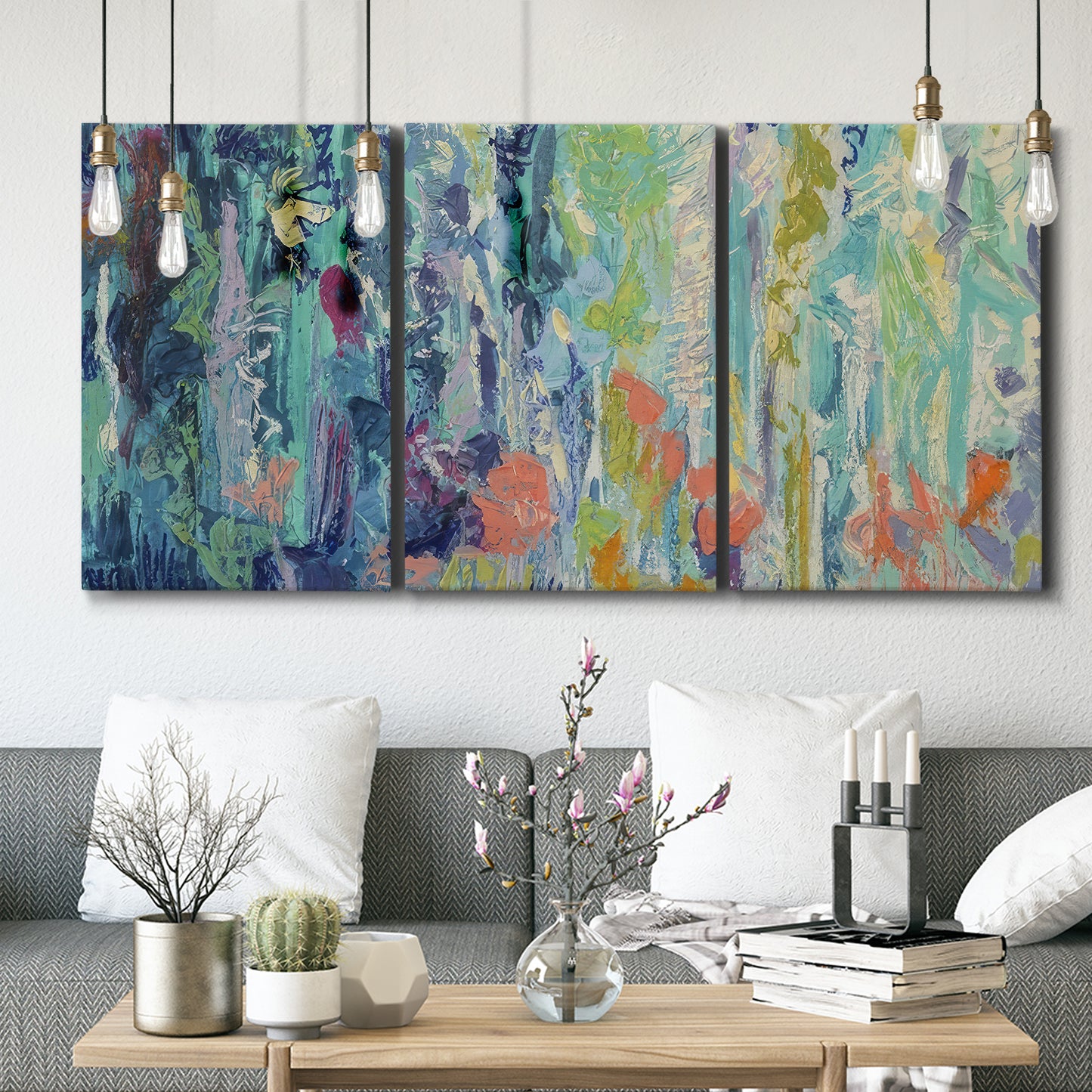 Three-panel canvas wall art featuring abstract rainfall with butterfly forms, displayed in a modern living room above seating.
