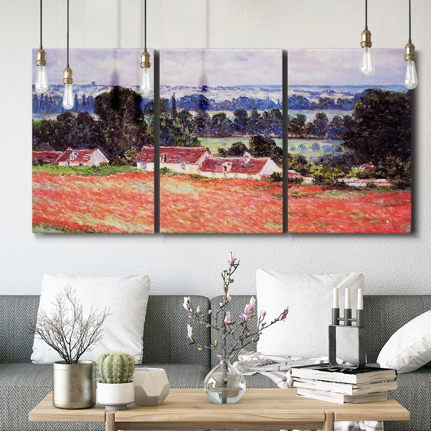 Three-panel canvas wall art featuring poppy field at giverny in bloom, displayed in a modern living room above seating.
