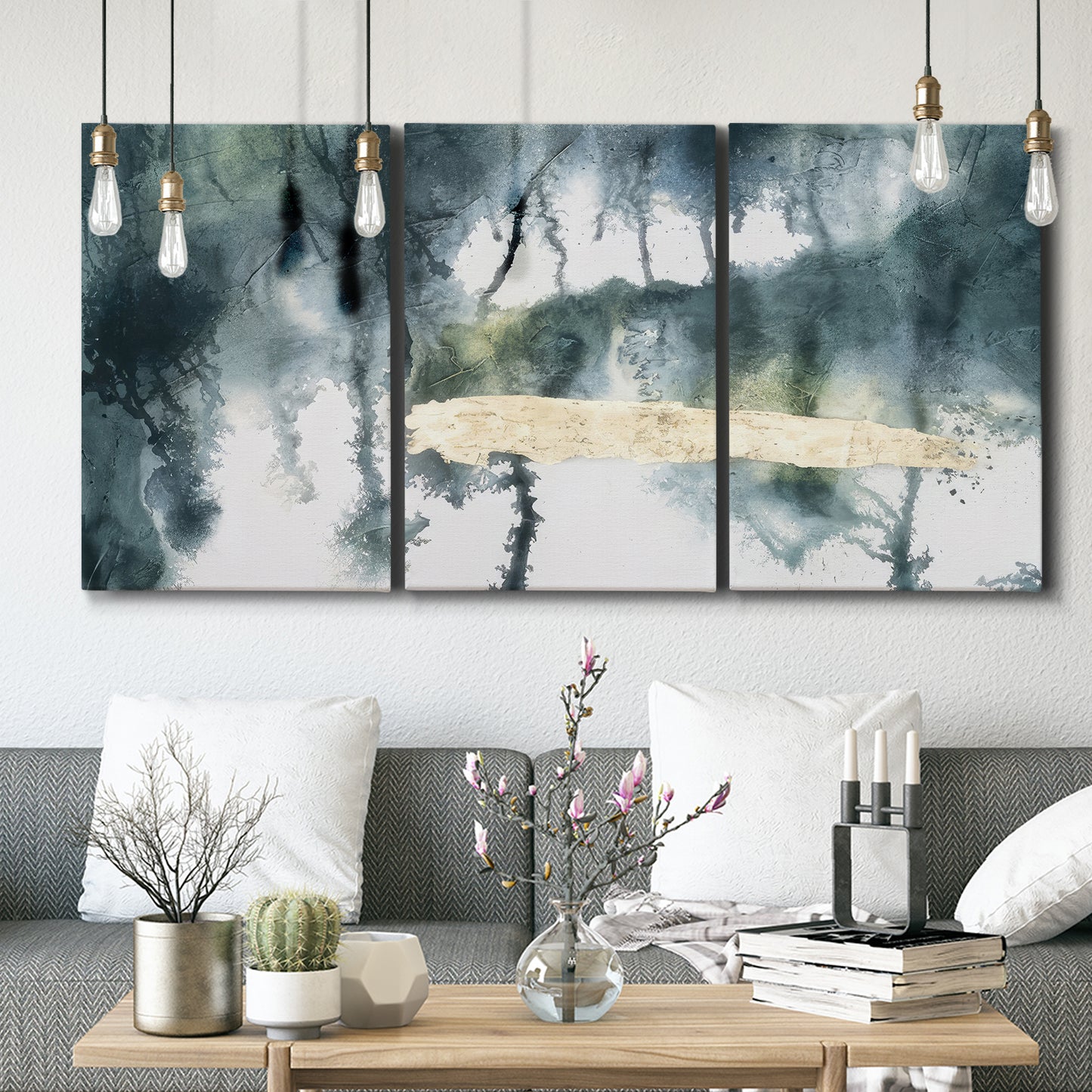 Three-panel canvas wall art featuring saturated abstract color fields, displayed in a modern living room above seating.