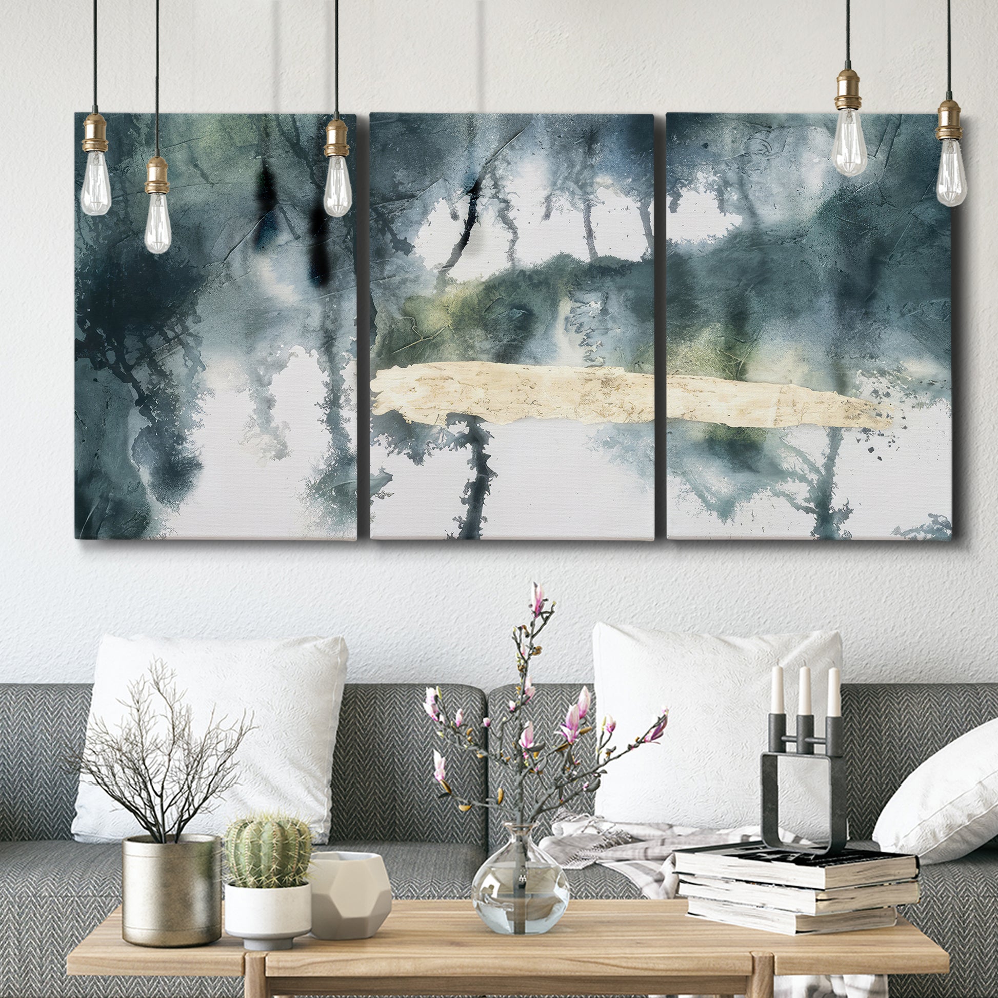 Three-panel canvas wall art featuring saturated abstract color fields, displayed in a modern living room above seating.