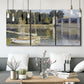 Three-panel canvas wall art featuring bridge crossing broad river, displayed in a modern living room above seating.