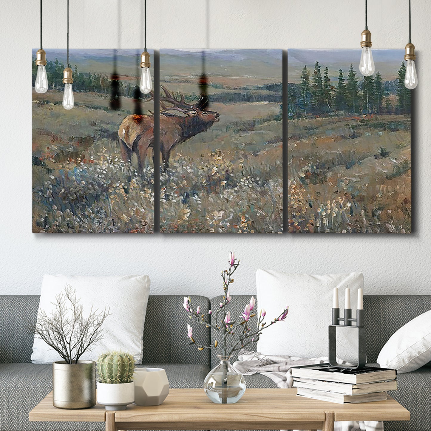 Three-panel canvas wall art featuring western wildlife grazing in open field, displayed in a modern living room above seating.