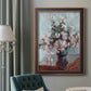 Impressionist chrysanthemum floral painting by Claude Monet in an ornate bronzed mahogany wood frame displayed in a dark-toned interior setting.