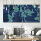Three-panel canvas wall art featuring abstract floral shapes, displayed in a modern living room above seating.