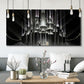 Three-panel canvas wall art featuring vintage city scene with figures, displayed in a modern living room above seating.
