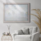 Impressionist atmospheric landscape in morning haze by Claude Monet in an ornate weathered white frame displayed in a bright interior setting.
