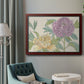 Contemporary peony flower illustration in an ornate cherry burl wood frame displayed in a neutral interior setting.