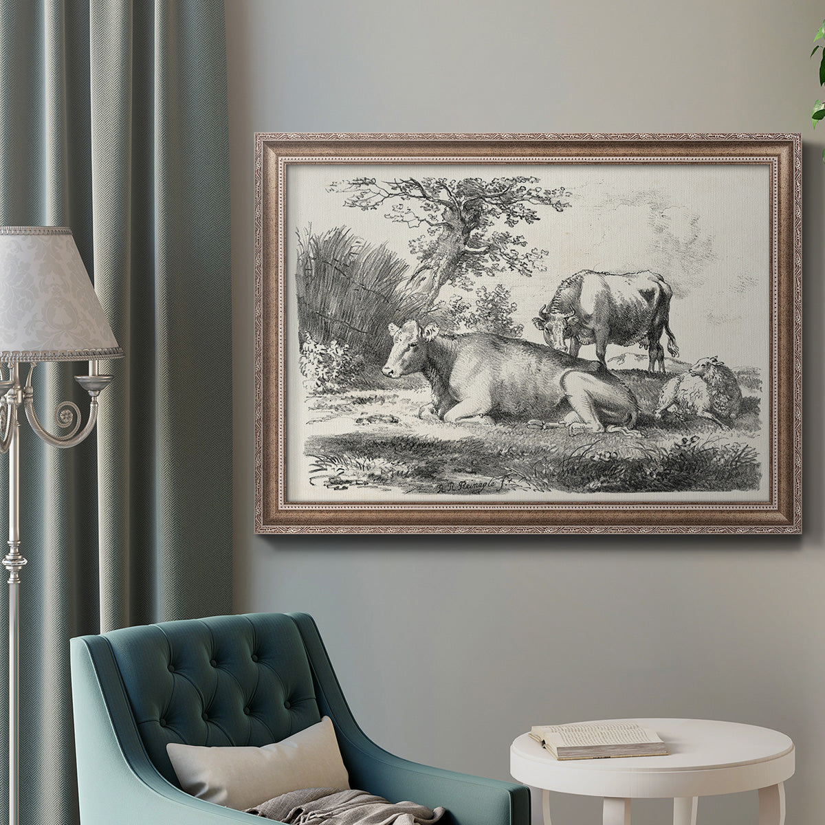 Classical pastoral landscape artwork by Nicolas Berchem in an ornate traditional silver frame displayed in a neutral interior setting.