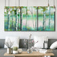 Three-panel canvas wall art featuring calm lake framed by aspen trees, displayed in a modern living room above seating.