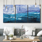 Three-panel canvas wall art featuring impressionist nautical harbor scene, displayed in a modern living room above seating.