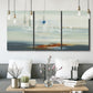 Three-panel canvas wall art featuring nautical abstract suggesting drifting calm, displayed in a modern living room above seating.