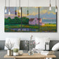 Three-panel canvas wall art featuring farmhouse near coastline landscape, displayed in a modern living room above seating.