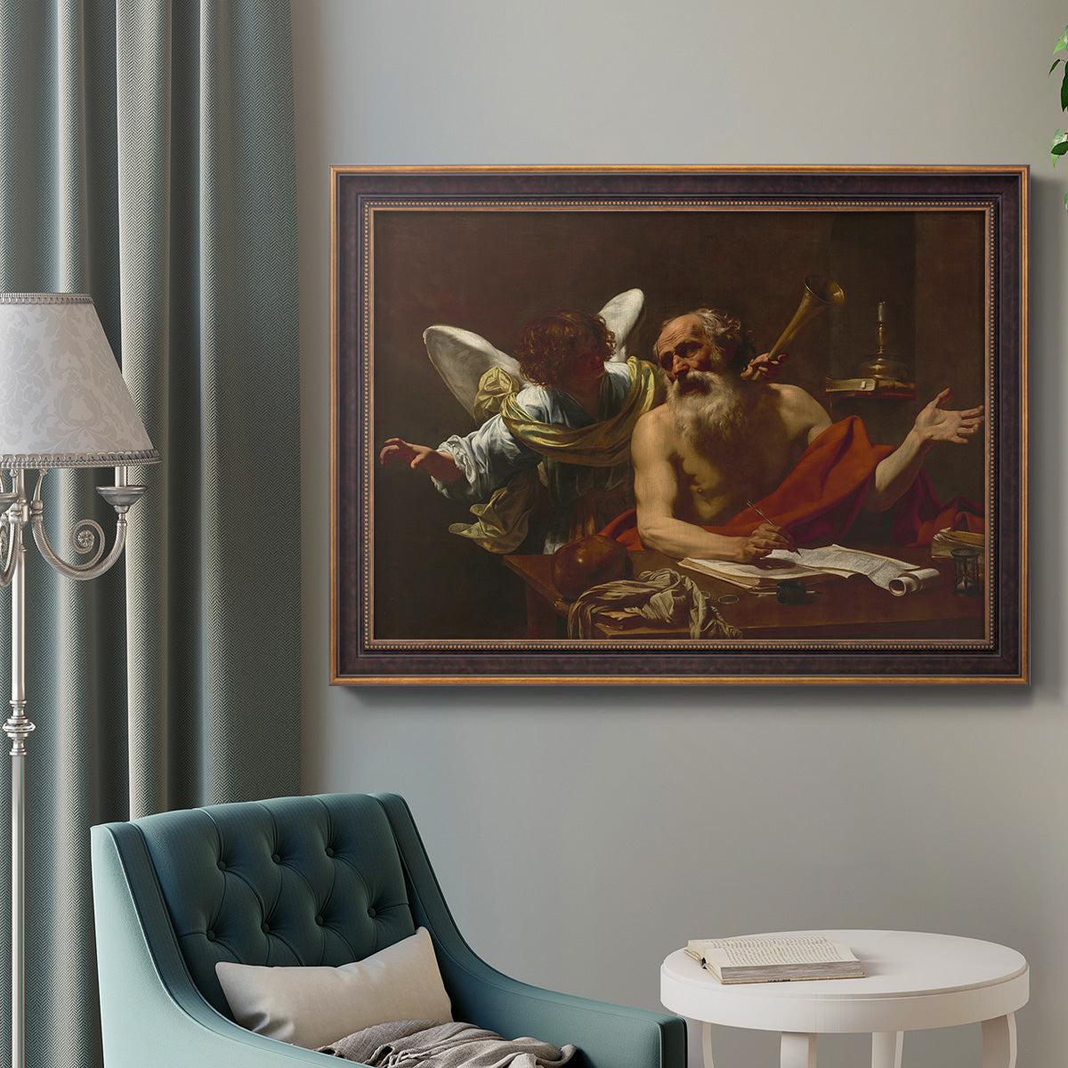 Classical religious painting of Saint Jerome with an angel by Simon Vouet in an ornate bronzed mahogany wood frame displayed in a bright interior setting.