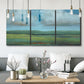 Three-panel canvas wall art featuring wide valley landscape with rolling hills, displayed in a modern living room above seating.