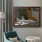 Impressionist still life with wine and bread by Claude Monet in an ornate bronzed mahogany wood frame displayed in a neutral interior setting.