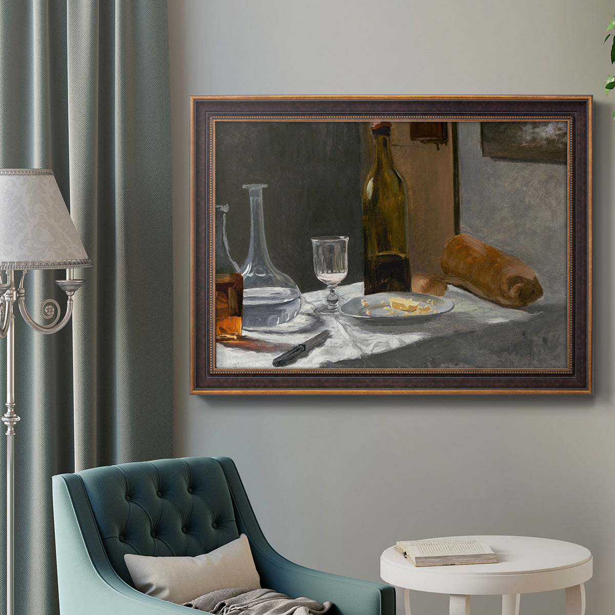 Impressionist still life with wine and bread by Claude Monet in an ornate bronzed mahogany wood frame displayed in a neutral interior setting.