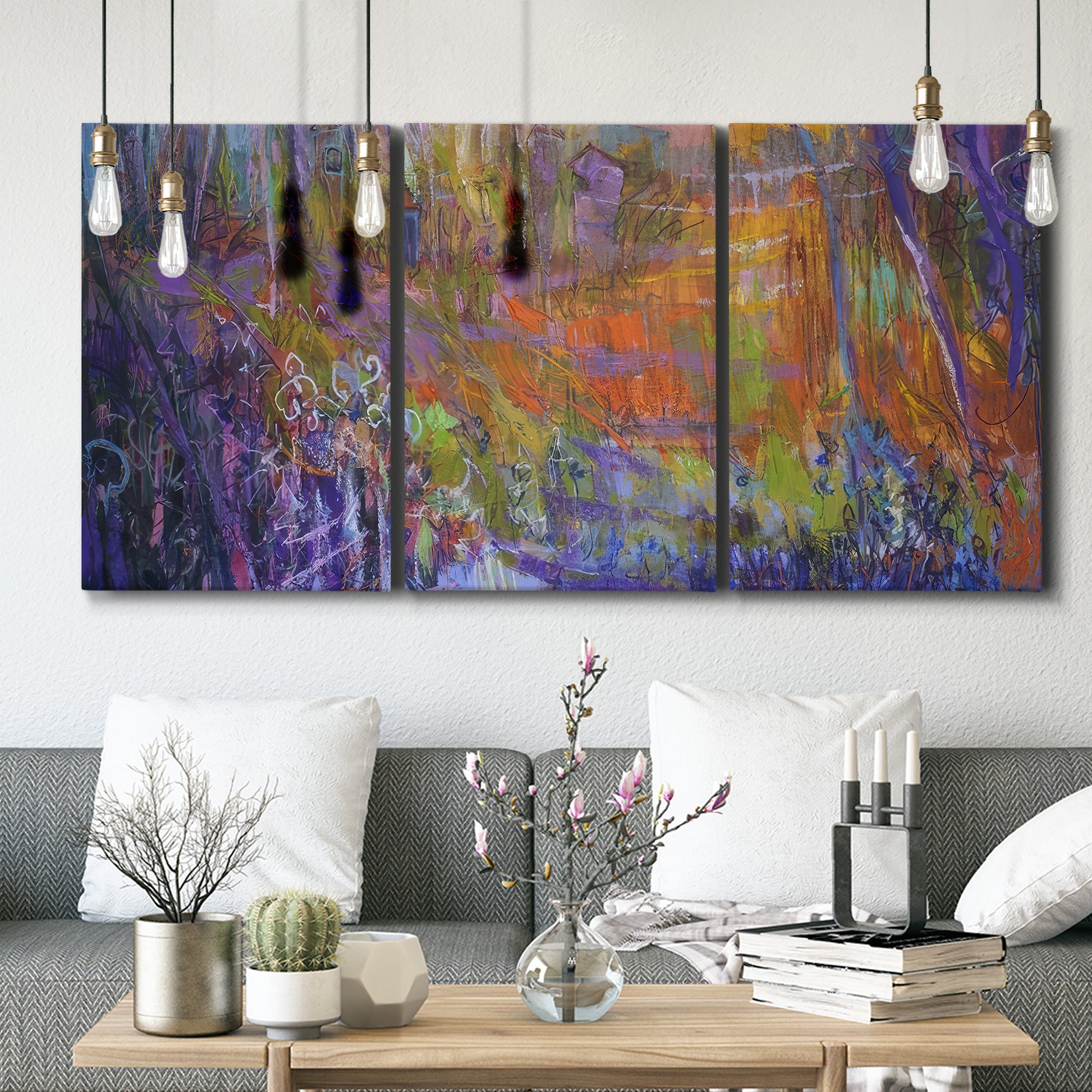 Three-panel canvas wall art featuring abstract rainfall with butterfly forms, displayed in a modern living room above seating.