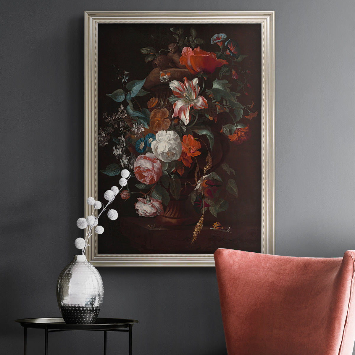 Classical floral still life painting by Jan van Huysum in an ornate champagne frame displayed in a dark-toned interior setting.