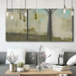 Three-panel canvas wall art featuring tall abstract tree form, displayed in a modern living room above seating.