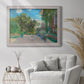 Impressionist residential landscape at Argenteuil by Claude Monet in an ornate weathered white frame displayed in a bright interior setting.