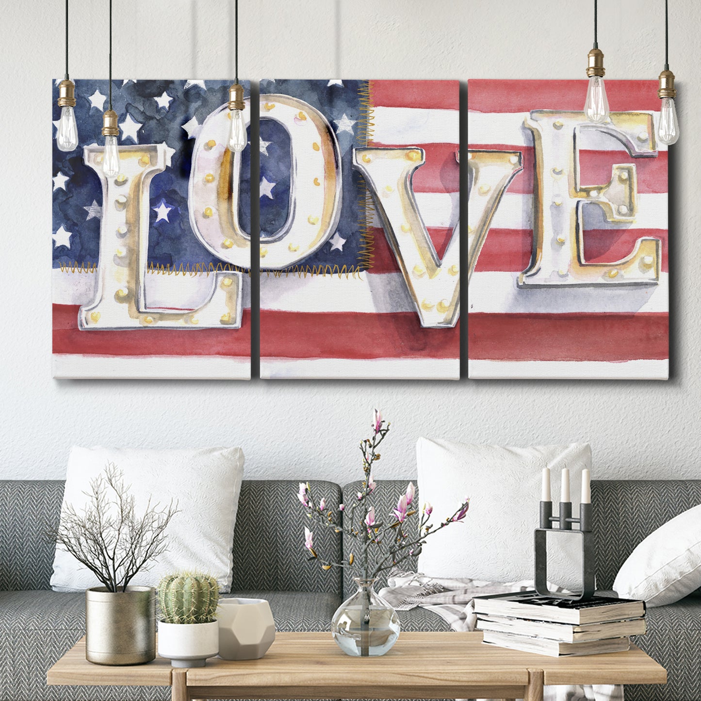 Three-panel canvas wall art featuring patriotic rustic typography art, displayed in a modern living room above seating.