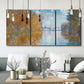 Three-panel canvas wall art featuring autumn landscape with glowing foliage, displayed in a modern living room above seating.