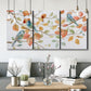 Three-panel canvas wall art featuring decorative bird trio illustration, displayed in a modern living room above seating.