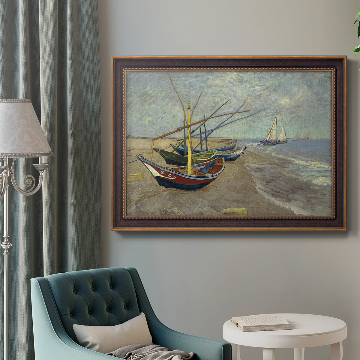 Impressionist coastal fishing boats scene by Vincent van Gogh in an ornate bronzed mahogany wood frame displayed in a bright interior setting.