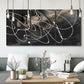 Three-panel canvas wall art featuring dark swirling abstract motion, displayed in a modern living room above seating.