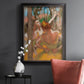 Impressionist ballet dancer composition by Edgar Degas in an ornate black frame with gilded inner detail displayed in a dark-toned interior setting.