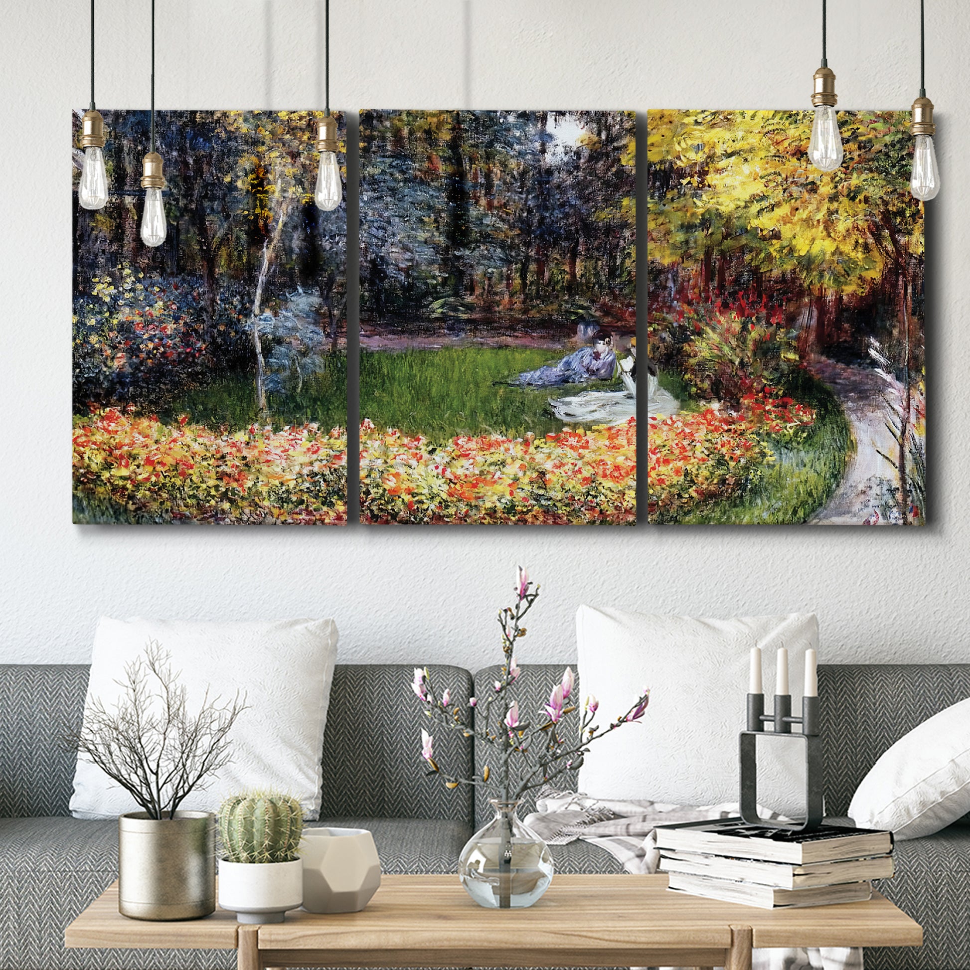 Three-panel canvas wall art featuring garden in full bloom by coast, displayed in a modern living room above seating.