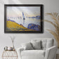 Impressionist coastal harbor at dusk by Paul Signac in an ornate black frame with gilded inner detail displayed in a bright interior setting.