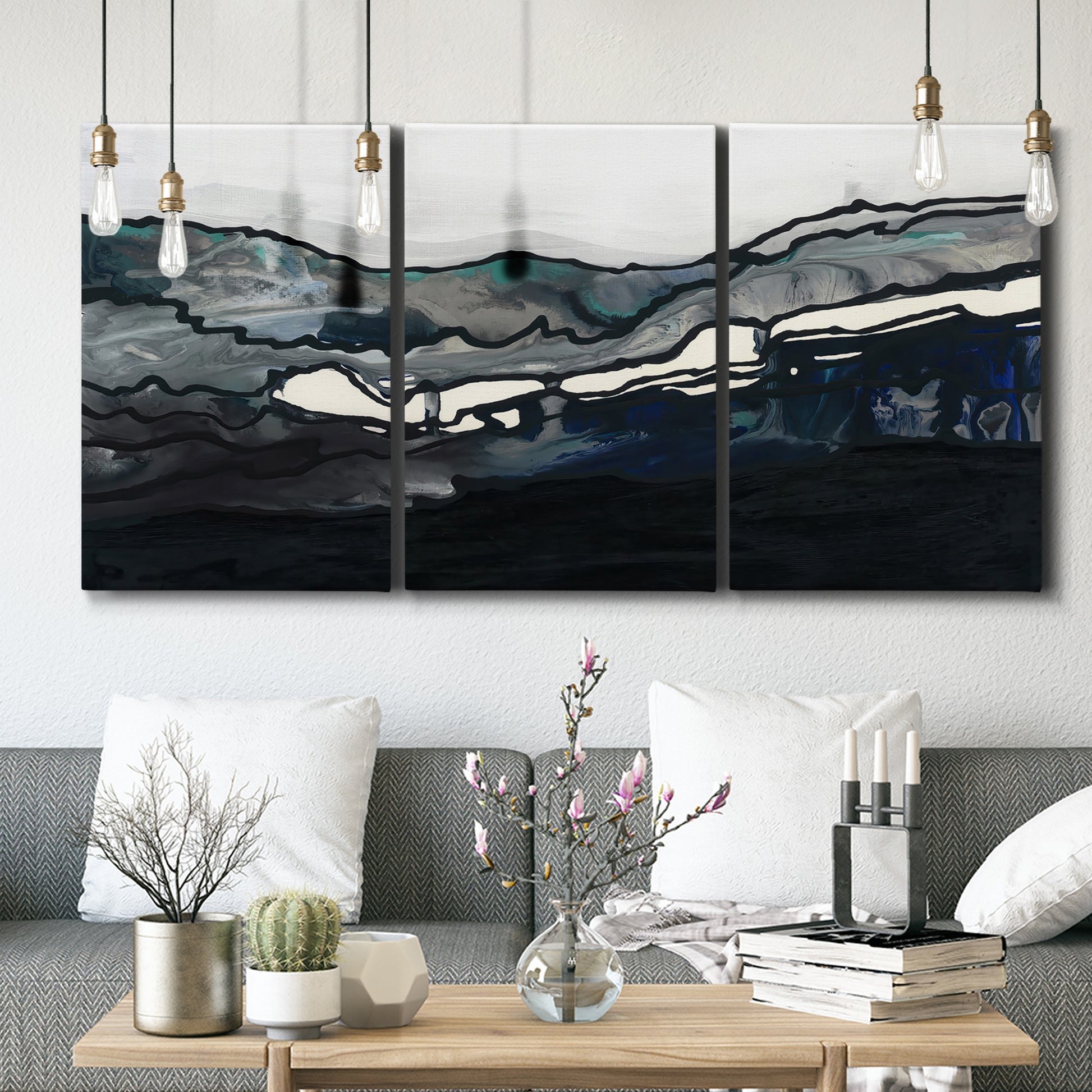 Three-panel canvas wall art featuring abstract passage of time composition, displayed in a modern living room above seating.