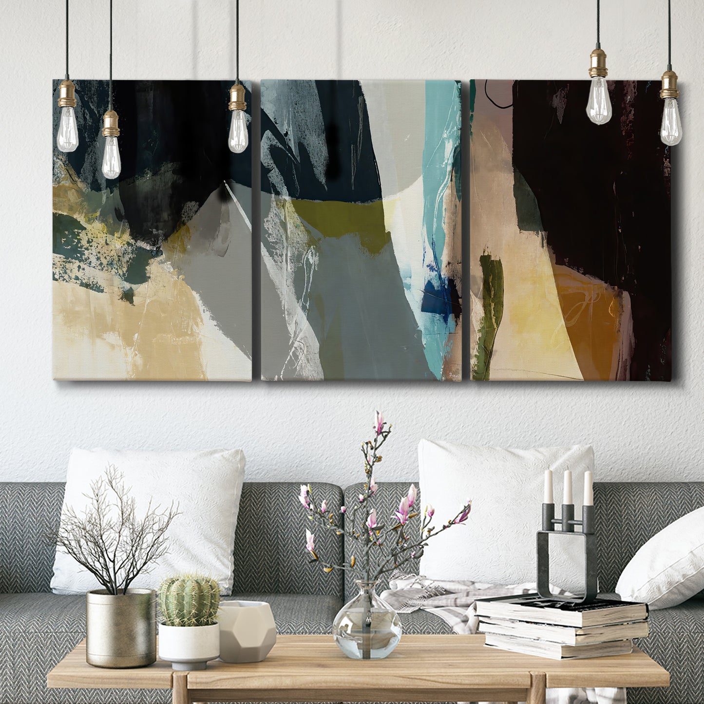 Three-panel canvas wall art featuring layered neutral abstract textures, displayed in a modern living room above seating.