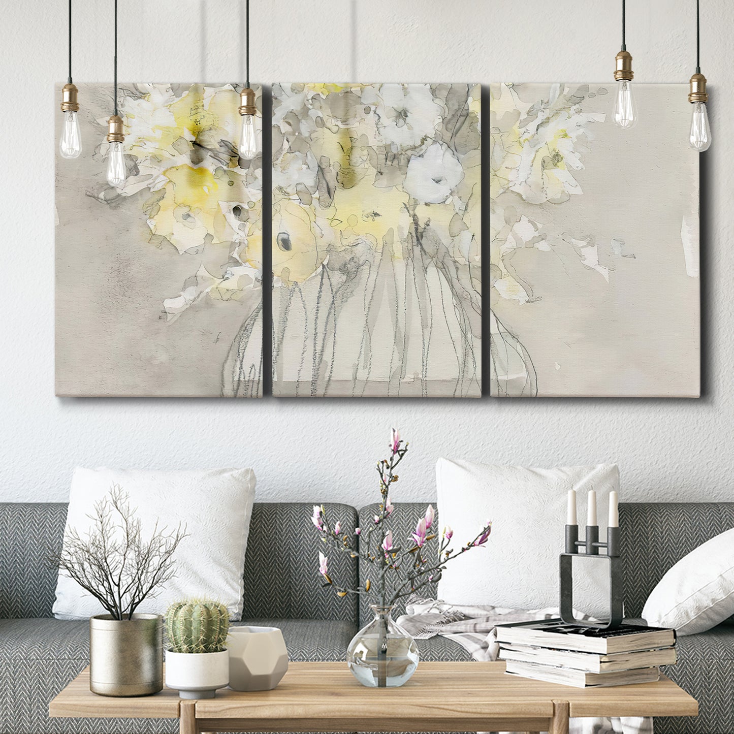 Three-panel canvas wall art featuring vintage floral abstract composition, displayed in a modern living room above seating.