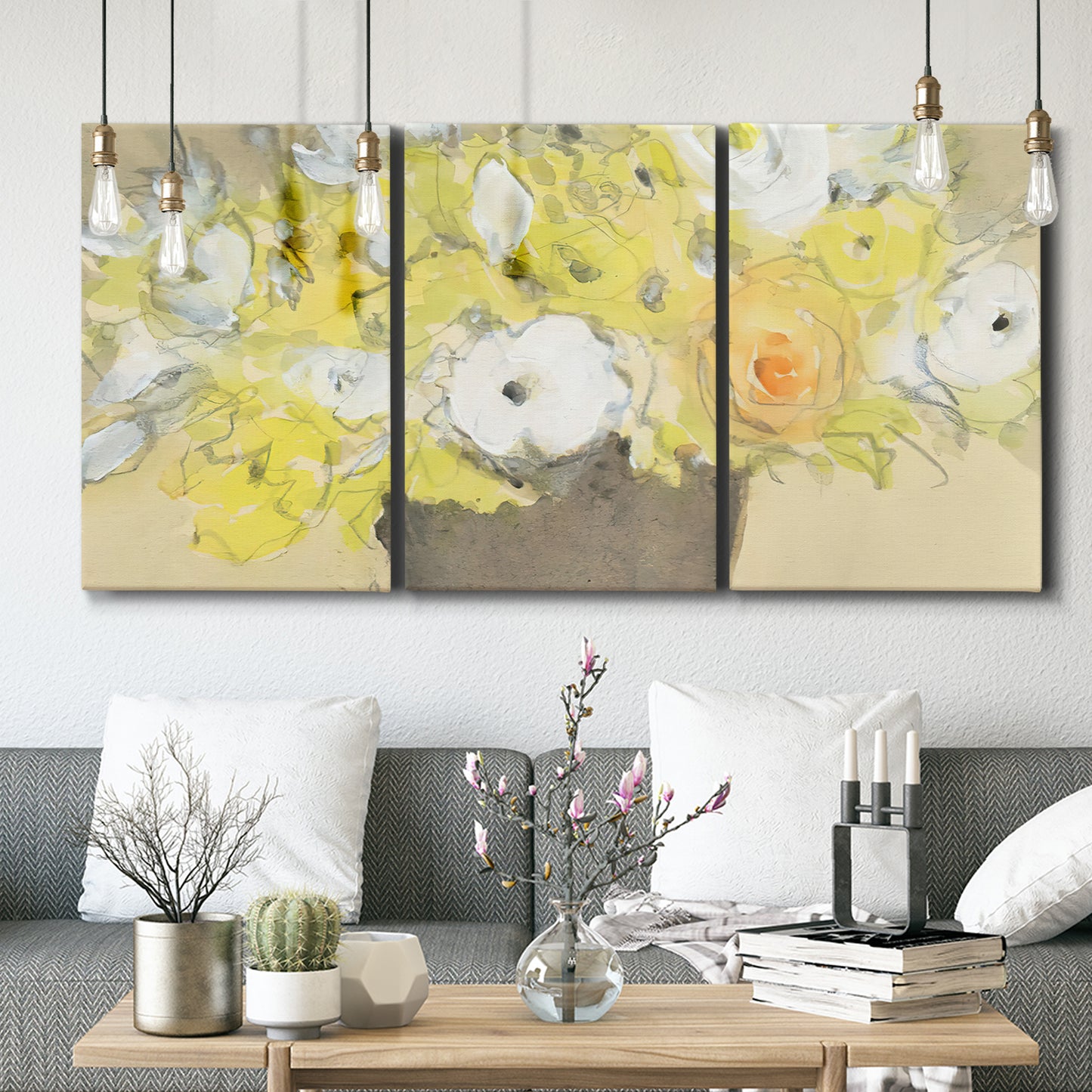 Three-panel canvas wall art featuring abstract floral table arrangement, displayed in a modern living room above seating.