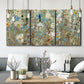Three-panel canvas wall art featuring abstract flowering vine pattern, displayed in a modern living room above seating.