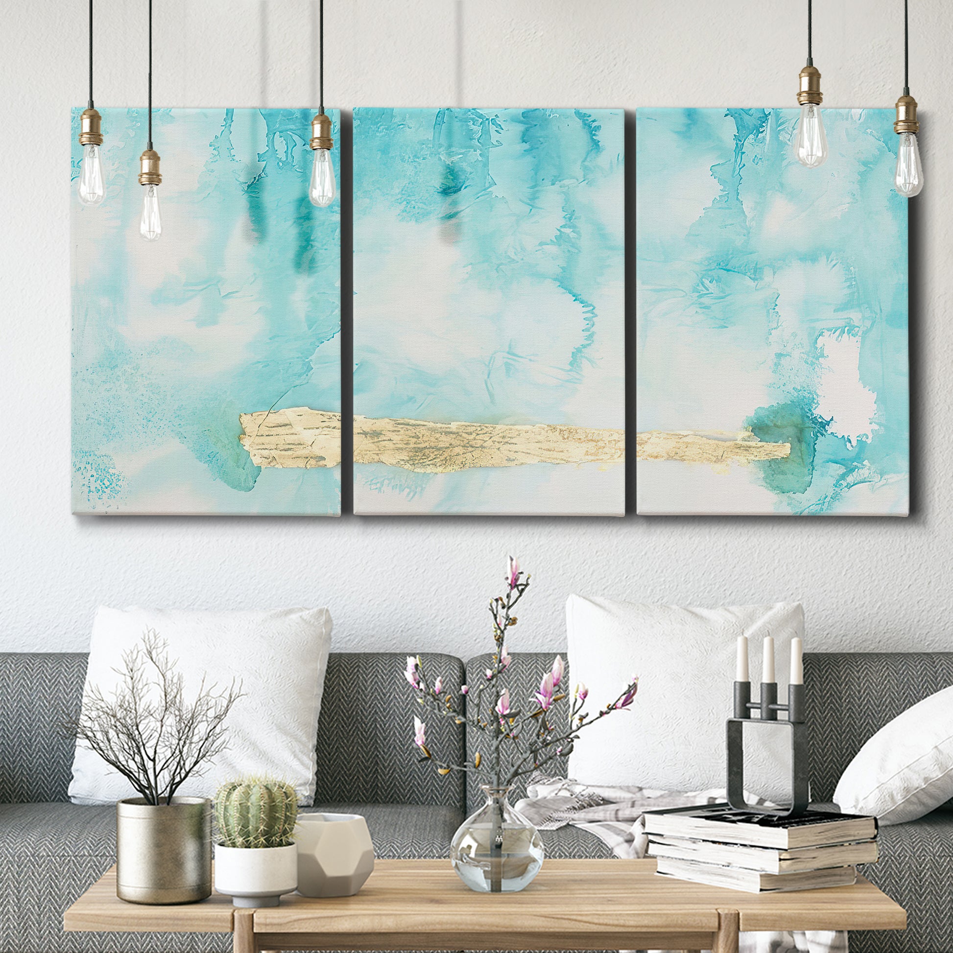 Three-panel canvas wall art featuring saturated abstract color fields, displayed in a modern living room above seating.