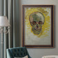 Expressive skull study painting by Vincent van Gogh in an ornate bronzed mahogany wood frame displayed in a dark-toned interior setting.