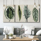 Three-panel canvas wall art featuring botanical palm leaf illustration, displayed in a modern living room above seating.