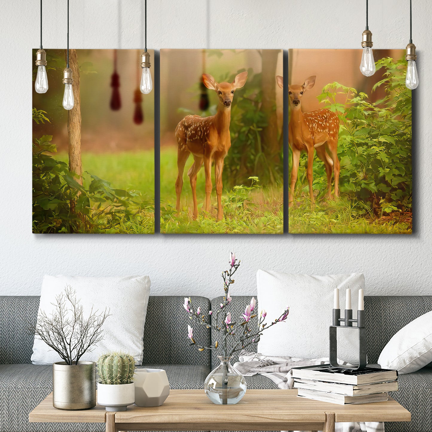 Three-panel canvas wall art featuring resting animals in open field, displayed in a modern living room above seating.