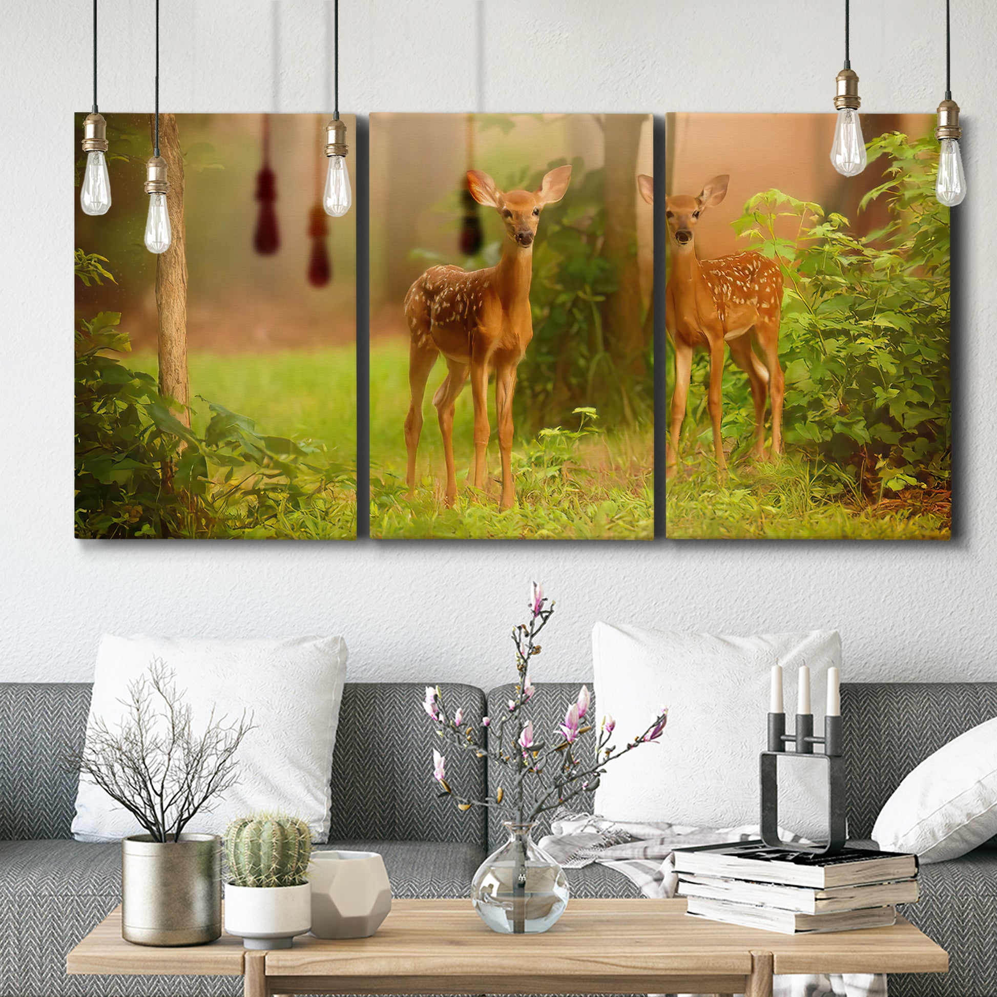Three-panel canvas wall art featuring resting animals in open field, displayed in a modern living room above seating.