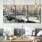 Three-panel canvas wall art featuring snowy village road in winter, displayed in a modern living room above seating.