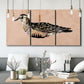 Three-panel canvas wall art featuring coastal bird illustration, displayed in a modern living room above seating.