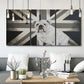Three-panel canvas wall art featuring black and white animal collage, displayed in a modern living room above seating.
