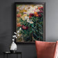Impressionist garden floral painting by Gustave Caillebotte in an ornate black frame with gilded inner detail displayed in a dark-toned interior setting.
