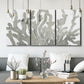 Three-panel canvas wall art featuring monochrome coral texture study, displayed in a modern living room above seating.