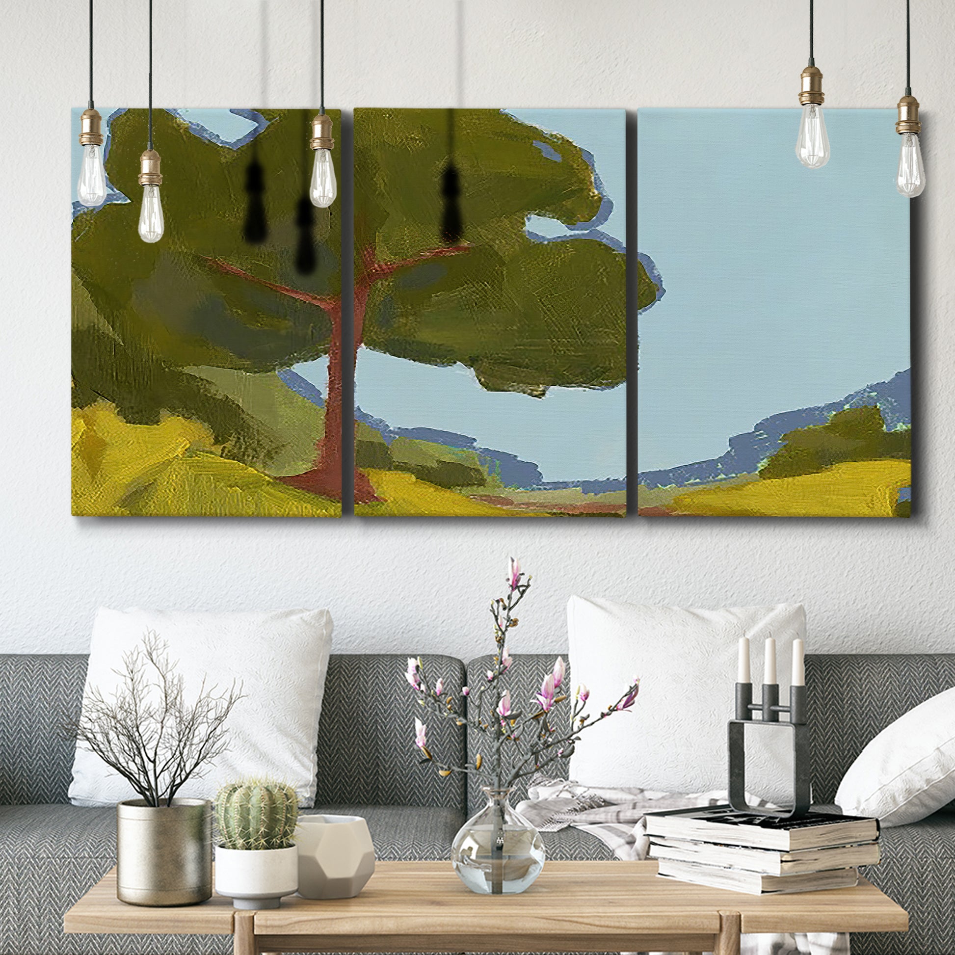 Three-panel canvas wall art featuring sunlit public park landscape view, displayed in a modern living room above seating.
