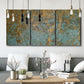 Three-panel canvas wall art featuring earthy copper toned abstract, displayed in a modern living room above seating.