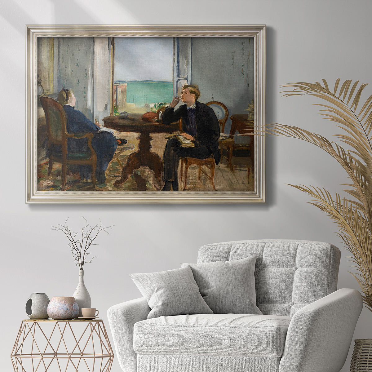 Impressionist interior scene by Édouard Manet in an ornate champagne frame displayed in a bright interior setting.